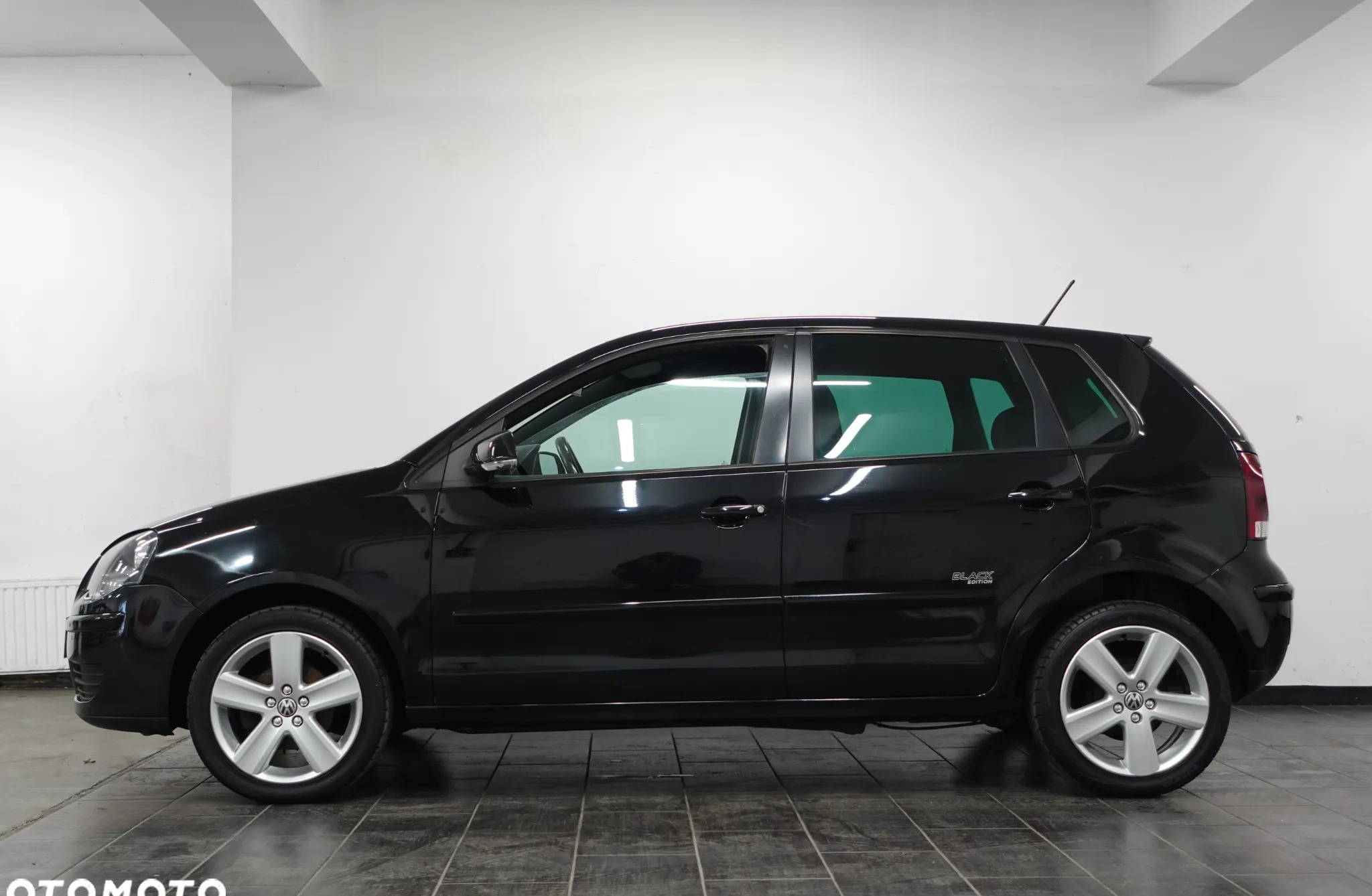 Volkswagen Polo cena 13900 przebieg: 197960, rok produkcji 2009 z Małogoszcz małe 667